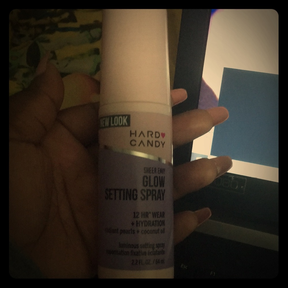 Sheer envy glow setting spray